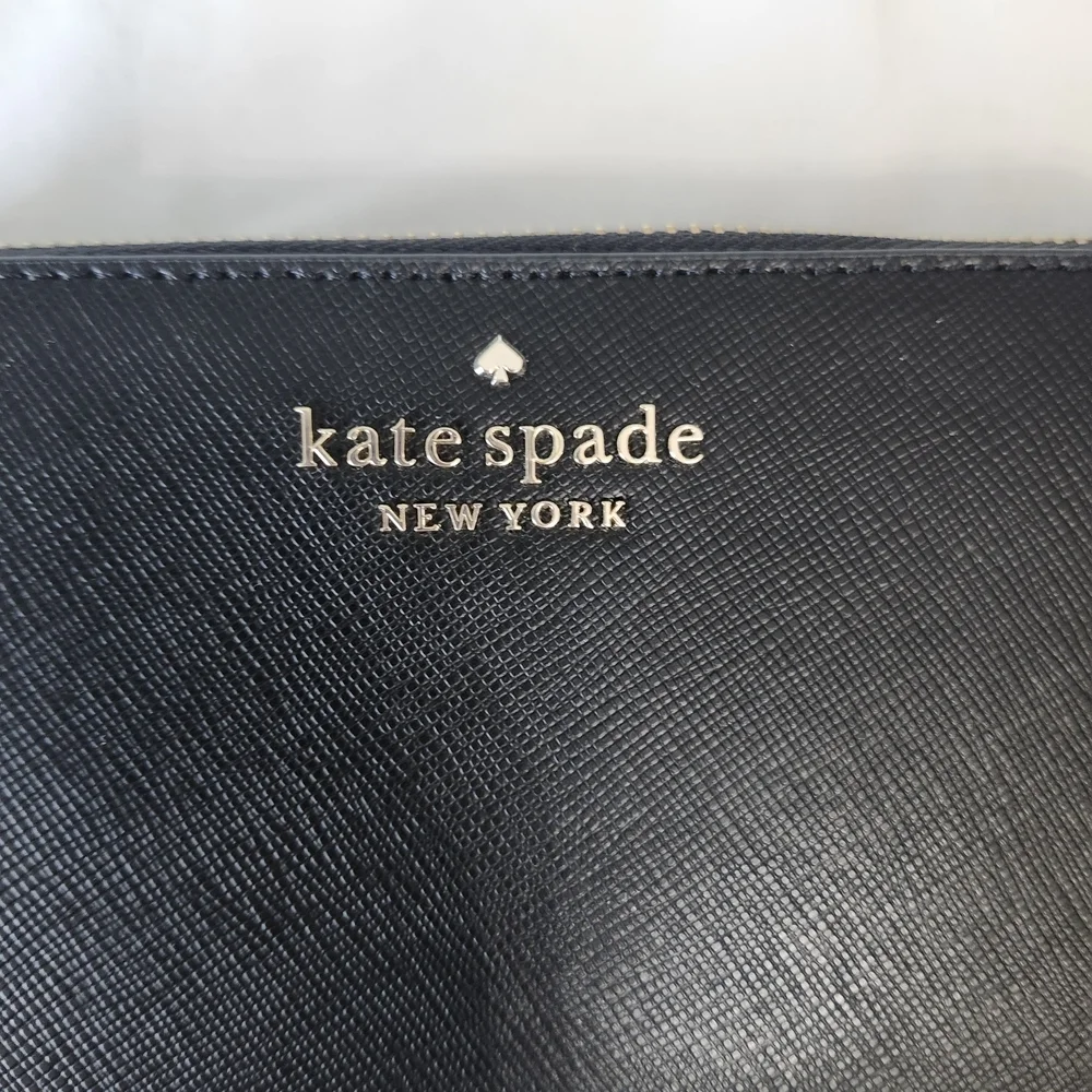 kate spade black zip-around saffiano wallet with gold logo